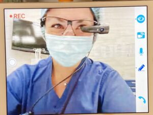 Kylie Tanabe PA using VUZIX smart glasses in the OR on the Help Lightning software system.