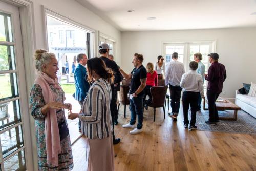 Fundraiser Guests Gather in a Living Room